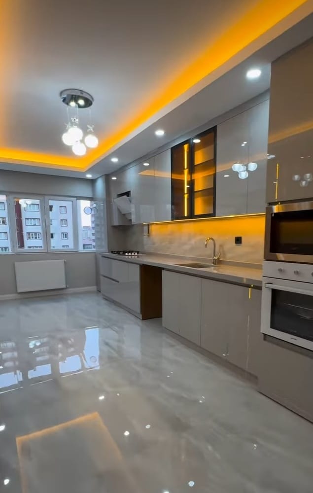 Gray L-Shape with Amber Ceiling